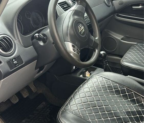 Серый Сузуки СХ4, объемом двигателя 1.6 л и пробегом 243 тыс. км за 7000 $, фото 4 на Automoto.ua