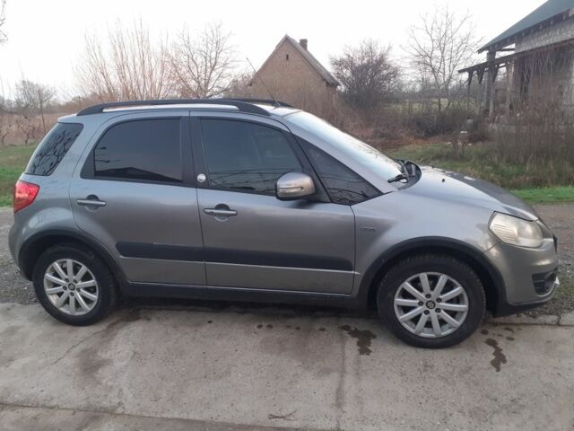 Серый Сузуки СХ4, объемом двигателя 2 л и пробегом 395 тыс. км за 6950 $, фото 3 на Automoto.ua