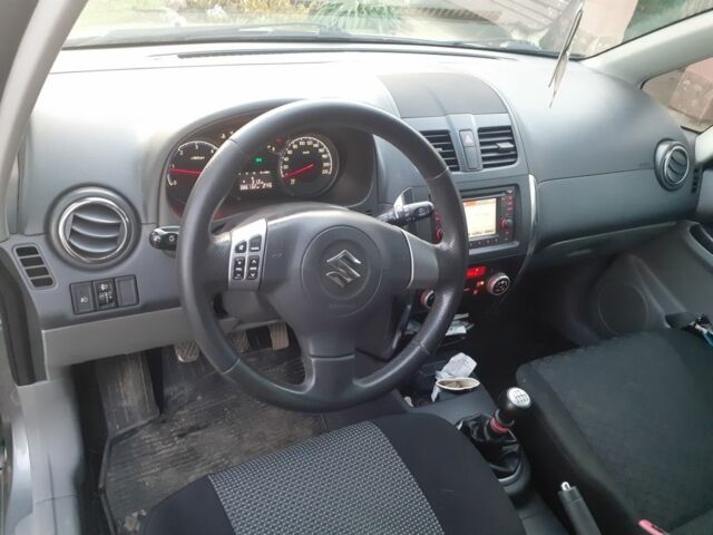 Серый Сузуки СХ4, объемом двигателя 2 л и пробегом 395 тыс. км за 6950 $, фото 5 на Automoto.ua