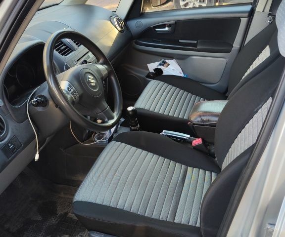 Серый Сузуки СХ4, объемом двигателя 0 л и пробегом 168 тыс. км за 6800 $, фото 4 на Automoto.ua