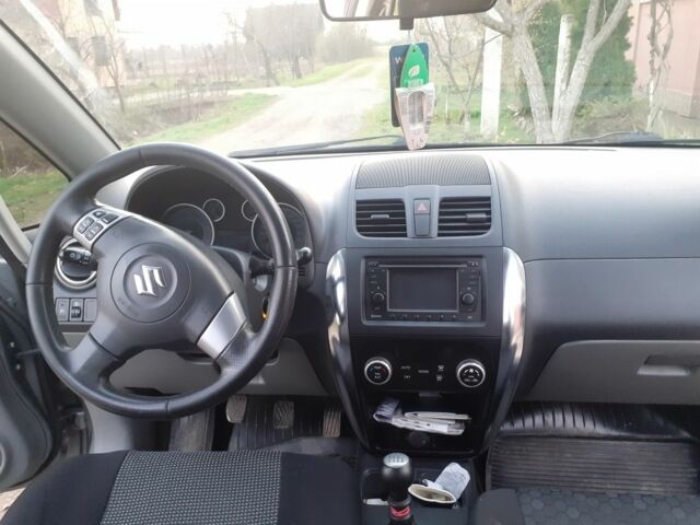 Серый Сузуки СХ4, объемом двигателя 2 л и пробегом 395 тыс. км за 6950 $, фото 8 на Automoto.ua