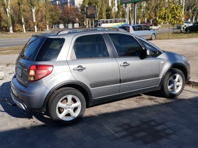 Серый Сузуки СХ4, объемом двигателя 1.6 л и пробегом 144 тыс. км за 7900 $, фото 2 на Automoto.ua