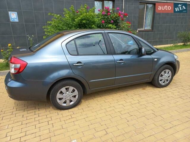 Серый Сузуки СХ4, объемом двигателя 1.59 л и пробегом 250 тыс. км за 5500 $, фото 6 на Automoto.ua