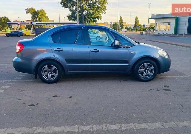 Сірий Сузукі СХ4, об'ємом двигуна 1.6 л та пробігом 298 тис. км за 5750 $, фото 2 на Automoto.ua
