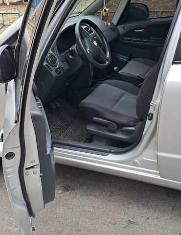 Серый Сузуки СХ4, объемом двигателя 1.6 л и пробегом 261 тыс. км за 4000 $, фото 5 на Automoto.ua