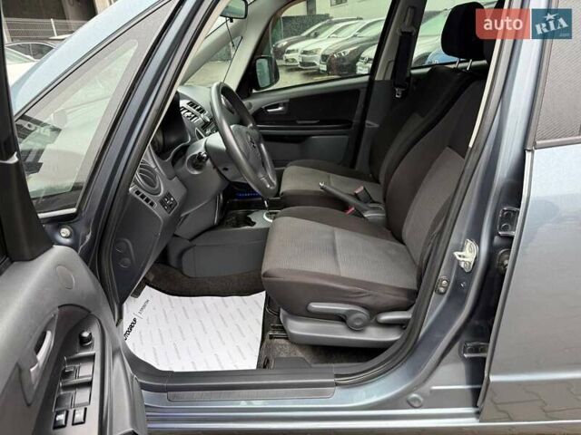 Серый Сузуки СХ4, объемом двигателя 1.6 л и пробегом 106 тыс. км за 6500 $, фото 12 на Automoto.ua