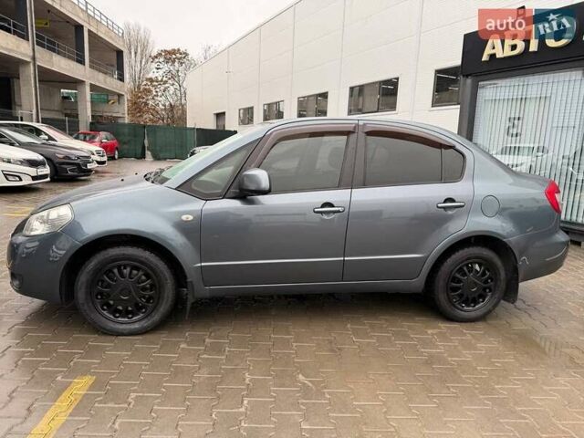 Серый Сузуки СХ4, объемом двигателя 1.6 л и пробегом 106 тыс. км за 6500 $, фото 2 на Automoto.ua