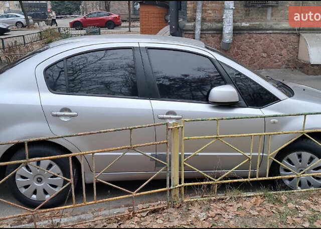 Серый Сузуки СХ4, объемом двигателя 1.6 л и пробегом 261 тыс. км за 4000 $, фото 7 на Automoto.ua