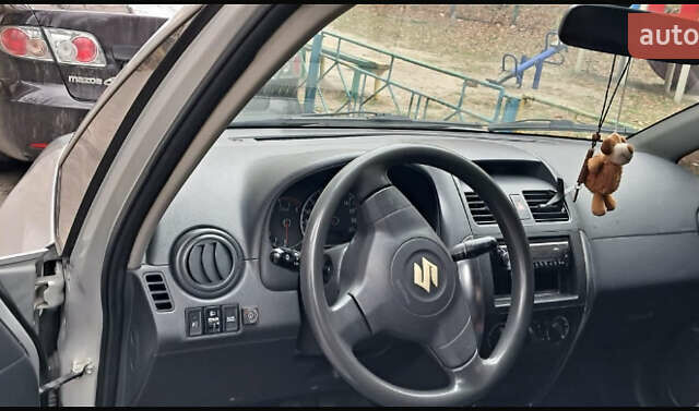 Серый Сузуки СХ4, объемом двигателя 1.6 л и пробегом 261 тыс. км за 4000 $, фото 4 на Automoto.ua