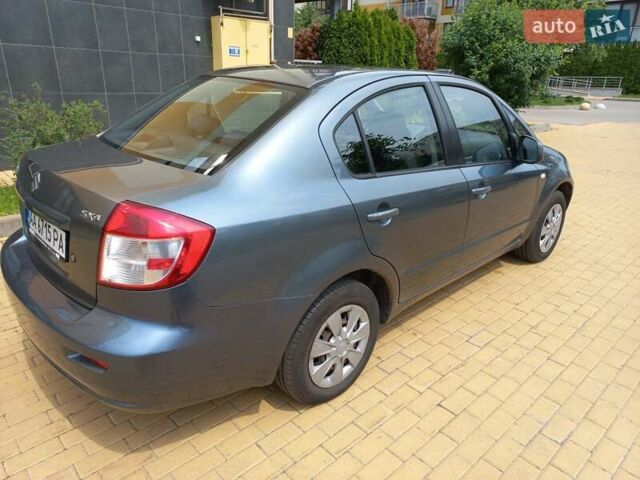 Серый Сузуки СХ4, объемом двигателя 1.59 л и пробегом 250 тыс. км за 5500 $, фото 5 на Automoto.ua