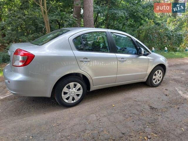 Серый Сузуки СХ4, объемом двигателя 1.6 л и пробегом 183 тыс. км за 4650 $, фото 3 на Automoto.ua