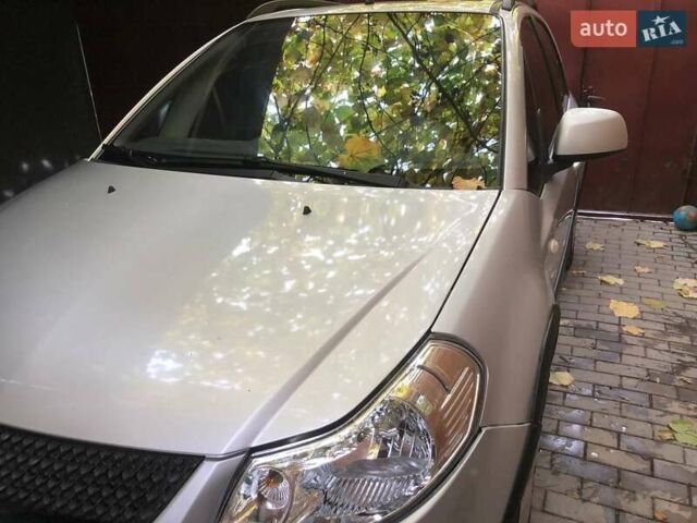 Серый Сузуки СХ4, объемом двигателя 1.59 л и пробегом 210 тыс. км за 7500 $, фото 9 на Automoto.ua