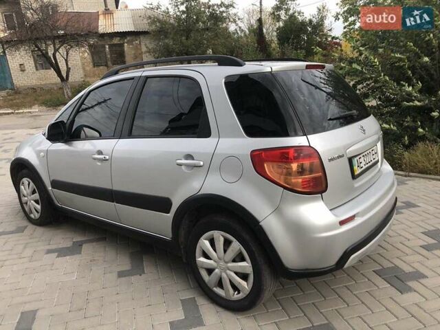 Серый Сузуки СХ4, объемом двигателя 1.59 л и пробегом 210 тыс. км за 7500 $, фото 2 на Automoto.ua