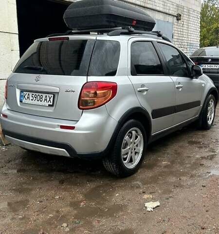 Серый Сузуки СХ4, объемом двигателя 1.6 л и пробегом 243 тыс. км за 7000 $, фото 1 на Automoto.ua