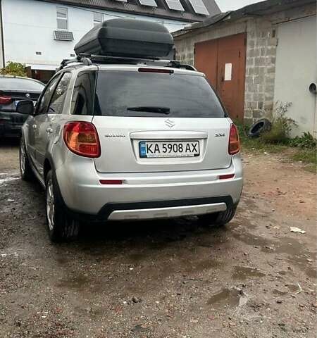 Серый Сузуки СХ4, объемом двигателя 1.6 л и пробегом 243 тыс. км за 7000 $, фото 2 на Automoto.ua