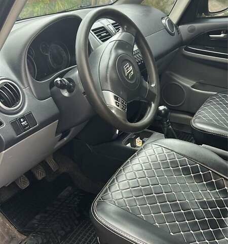 Серый Сузуки СХ4, объемом двигателя 1.6 л и пробегом 243 тыс. км за 7000 $, фото 3 на Automoto.ua