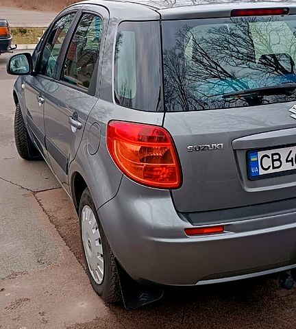 Серый Сузуки СХ4, объемом двигателя 1.6 л и пробегом 259 тыс. км за 5900 $, фото 2 на Automoto.ua
