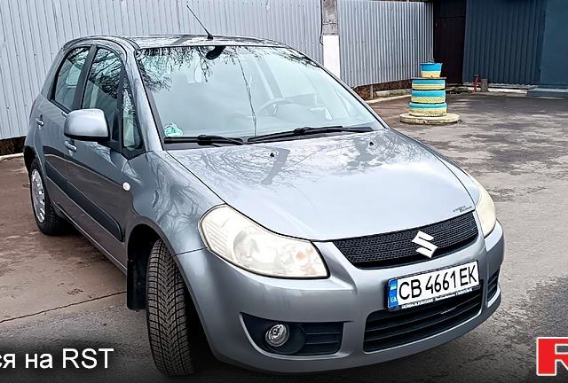 Серый Сузуки СХ4, объемом двигателя 1.6 л и пробегом 259 тыс. км за 5900 $, фото 1 на Automoto.ua