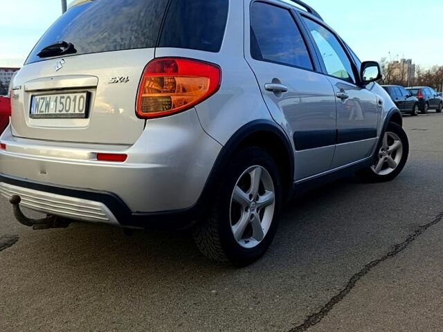 Серый Сузуки СХ4, объемом двигателя 1.9 л и пробегом 270 тыс. км за 4500 $, фото 2 на Automoto.ua