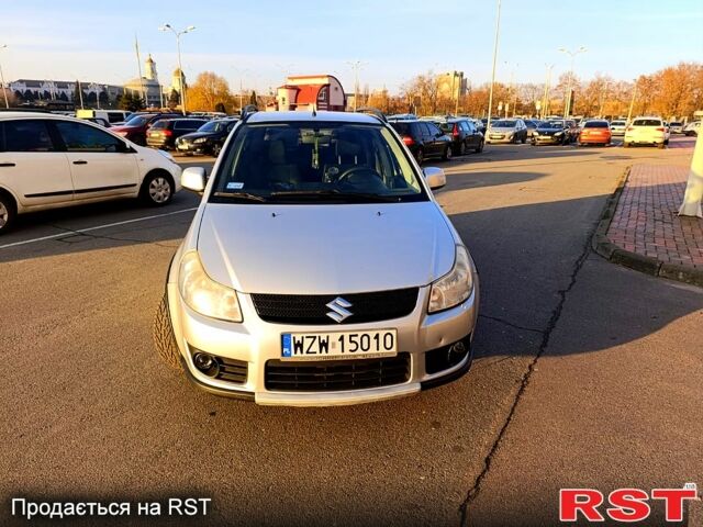 Серый Сузуки СХ4, объемом двигателя 1.9 л и пробегом 270 тыс. км за 4500 $, фото 1 на Automoto.ua