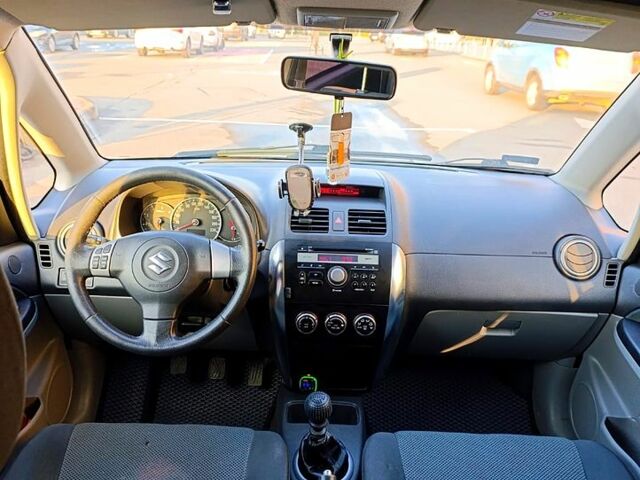 Серый Сузуки СХ4, объемом двигателя 1.9 л и пробегом 270 тыс. км за 4500 $, фото 5 на Automoto.ua