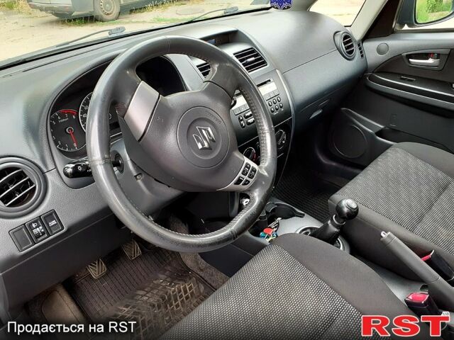 Серый Сузуки СХ4, объемом двигателя 1.6 л и пробегом 220 тыс. км за 6800 $, фото 7 на Automoto.ua