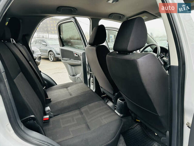 Сірий Сузукі СХ4, об'ємом двигуна 2 л та пробігом 187 тис. км за 7800 $, фото 17 на Automoto.ua