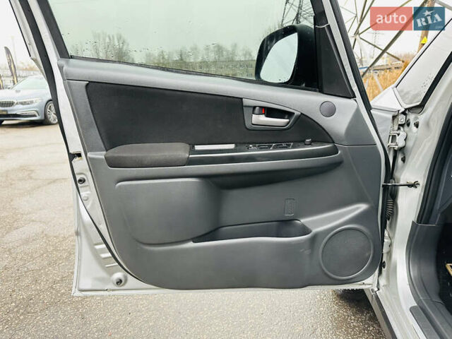 Сірий Сузукі СХ4, об'ємом двигуна 2 л та пробігом 187 тис. км за 7800 $, фото 14 на Automoto.ua