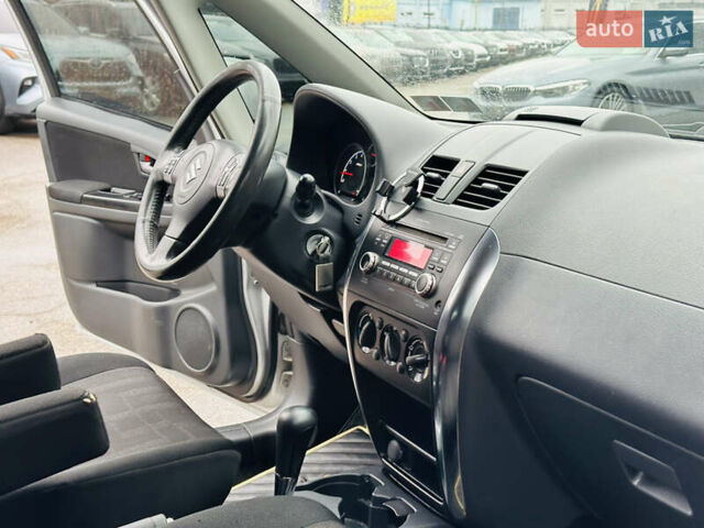 Сірий Сузукі СХ4, об'ємом двигуна 2 л та пробігом 187 тис. км за 7800 $, фото 23 на Automoto.ua