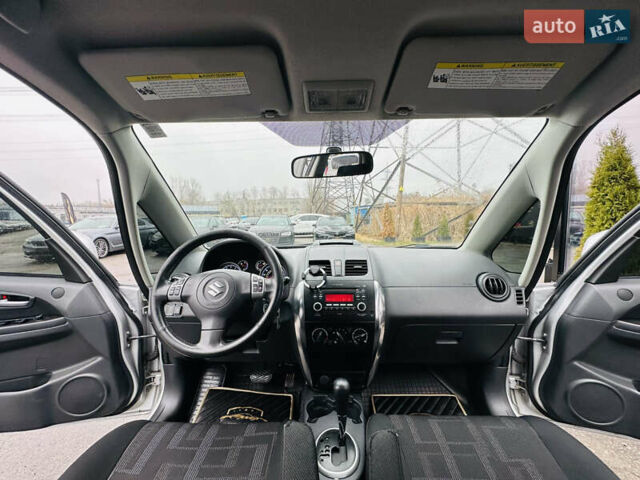 Сірий Сузукі СХ4, об'ємом двигуна 2 л та пробігом 187 тис. км за 7800 $, фото 18 на Automoto.ua
