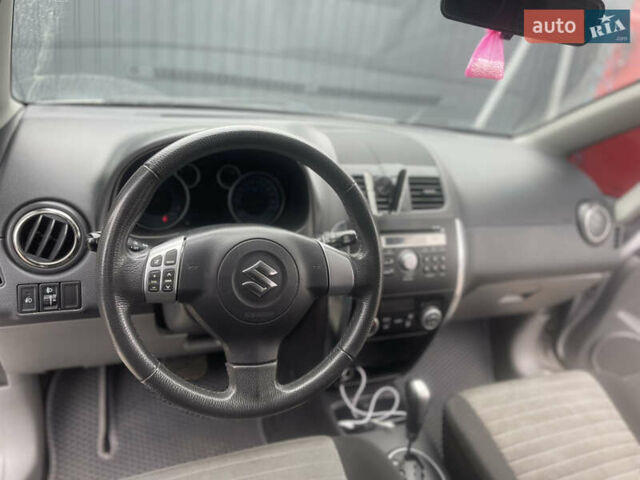 Сузуки СХ4 2010 в Черкассах на Automoto.ua Серый Сузуки СХ4, объемом двигателя 1.6 л и пробегом 245 тыс. км за 9300 $, фото 5 на Automoto.ua