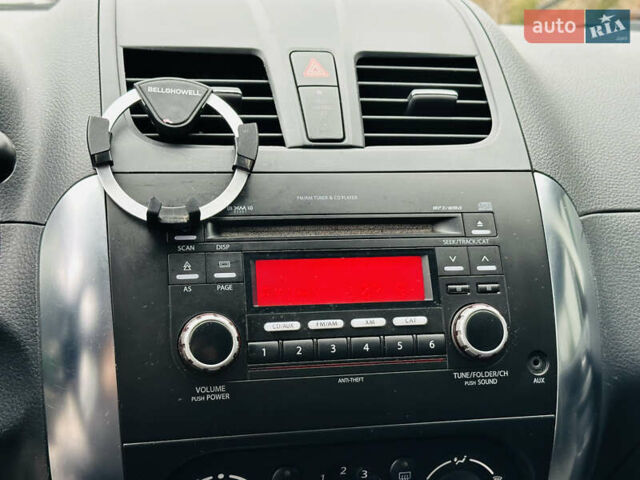 Сірий Сузукі СХ4, об'ємом двигуна 2 л та пробігом 187 тис. км за 7800 $, фото 30 на Automoto.ua