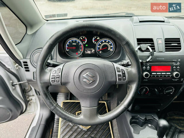 Сірий Сузукі СХ4, об'ємом двигуна 2 л та пробігом 187 тис. км за 7800 $, фото 26 на Automoto.ua