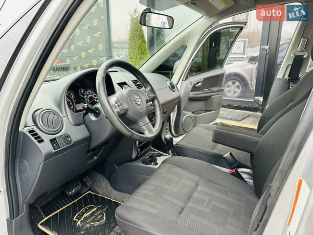 Сірий Сузукі СХ4, об'ємом двигуна 2 л та пробігом 187 тис. км за 7800 $, фото 12 на Automoto.ua