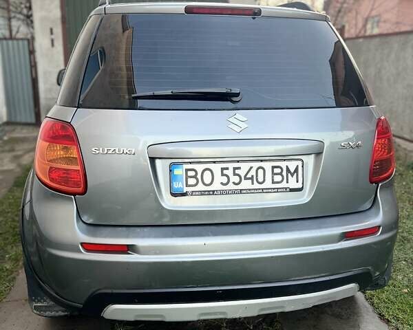Серый Сузуки СХ4, объемом двигателя 1.59 л и пробегом 85 тыс. км за 7000 $, фото 10 на Automoto.ua