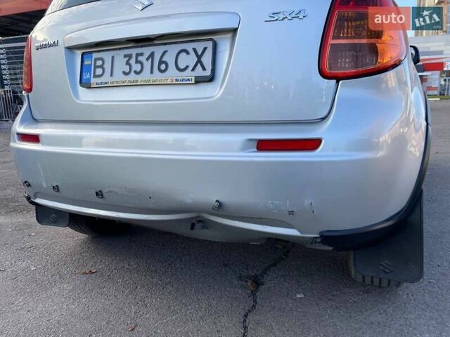 Серый Сузуки СХ4, объемом двигателя 1.59 л и пробегом 82 тыс. км за 9453 $, фото 5 на Automoto.ua