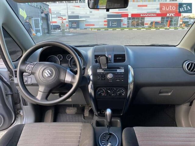 Серый Сузуки СХ4, объемом двигателя 1.59 л и пробегом 82 тыс. км за 9453 $, фото 16 на Automoto.ua
