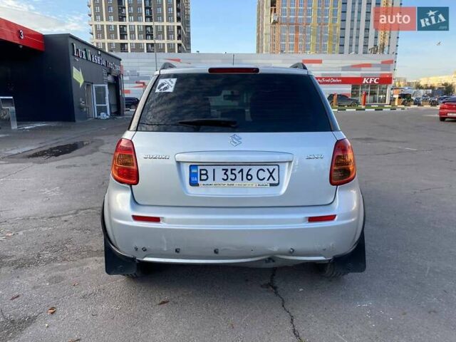 Серый Сузуки СХ4, объемом двигателя 1.59 л и пробегом 82 тыс. км за 9453 $, фото 3 на Automoto.ua