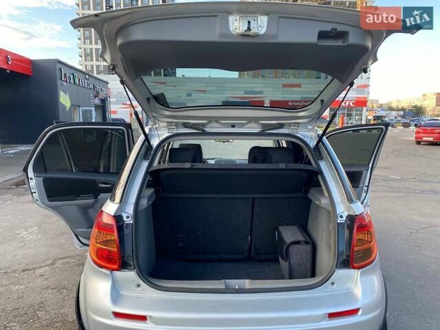 Серый Сузуки СХ4, объемом двигателя 1.59 л и пробегом 82 тыс. км за 9453 $, фото 6 на Automoto.ua