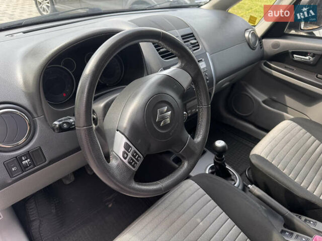 Сірий Сузукі СХ4, об'ємом двигуна 1.6 л та пробігом 160 тис. км за 8700 $, фото 14 на Automoto.ua