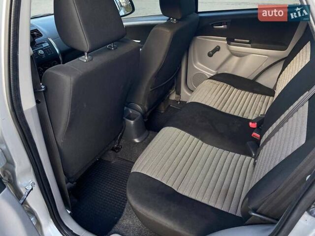 Серый Сузуки СХ4, объемом двигателя 1.59 л и пробегом 82 тыс. км за 9453 $, фото 20 на Automoto.ua