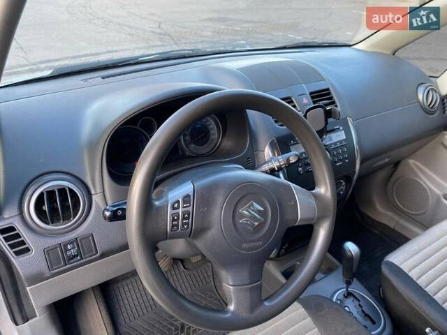 Серый Сузуки СХ4, объемом двигателя 1.59 л и пробегом 82 тыс. км за 9453 $, фото 17 на Automoto.ua