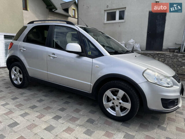 Серый Сузуки СХ4, объемом двигателя 1.6 л и пробегом 160 тыс. км за 8200 $, фото 3 на Automoto.ua