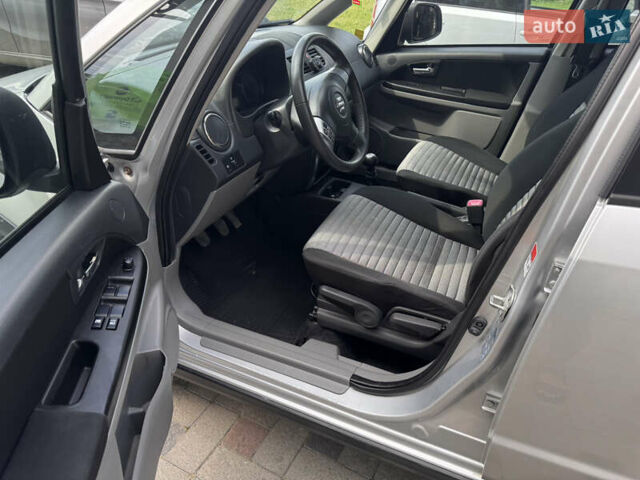 Сірий Сузукі СХ4, об'ємом двигуна 1.6 л та пробігом 160 тис. км за 8700 $, фото 12 на Automoto.ua