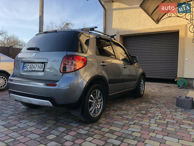 Серый Сузуки СХ4, объемом двигателя 1.6 л и пробегом 162 тыс. км за 7500 $, фото 2 на Automoto.ua