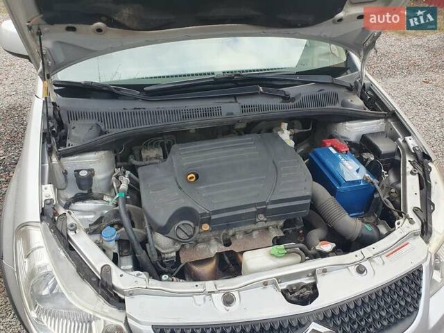 Серый Сузуки СХ4, объемом двигателя 1.6 л и пробегом 118 тыс. км за 9500 $, фото 15 на Automoto.ua
