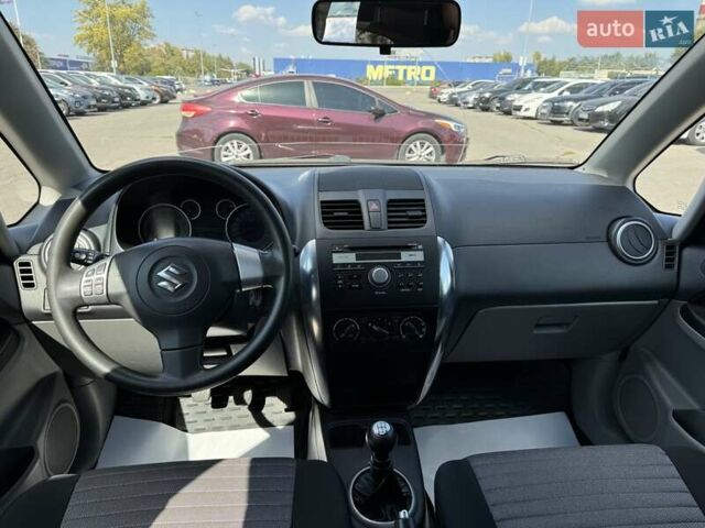 Сірий Сузукі СХ4, об'ємом двигуна 1.59 л та пробігом 206 тис. км за 8100 $, фото 10 на Automoto.ua