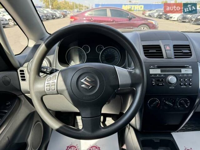 Сірий Сузукі СХ4, об'ємом двигуна 1.59 л та пробігом 206 тис. км за 8100 $, фото 11 на Automoto.ua
