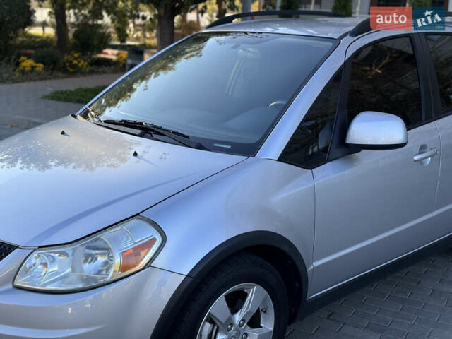 Сірий Сузукі СХ4, об'ємом двигуна 2 л та пробігом 100 тис. км за 8400 $, фото 22 на Automoto.ua