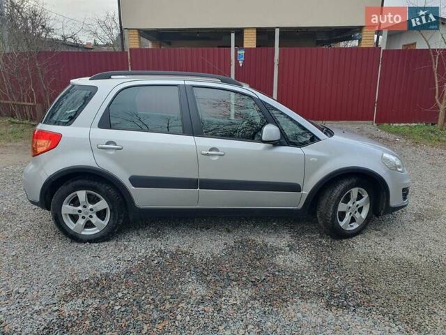 Серый Сузуки СХ4, объемом двигателя 1.6 л и пробегом 118 тыс. км за 9500 $, фото 6 на Automoto.ua